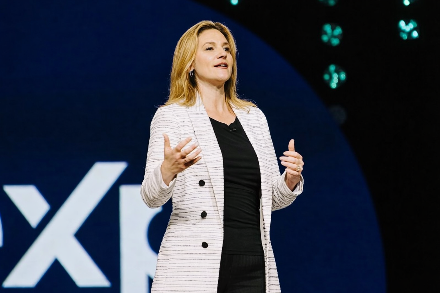 Stephanie Gilezan speaking on stage